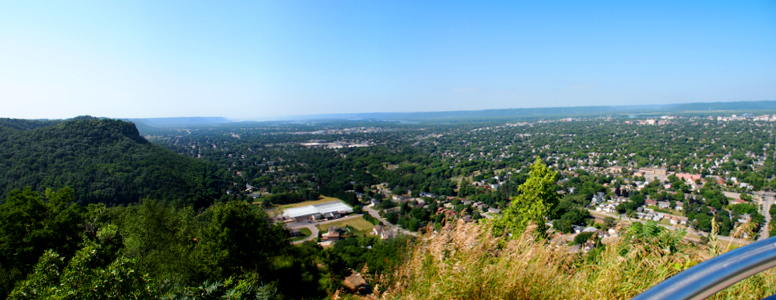 [Several photos stitched together showing part of the panorama visible from the south end of the bluff.]